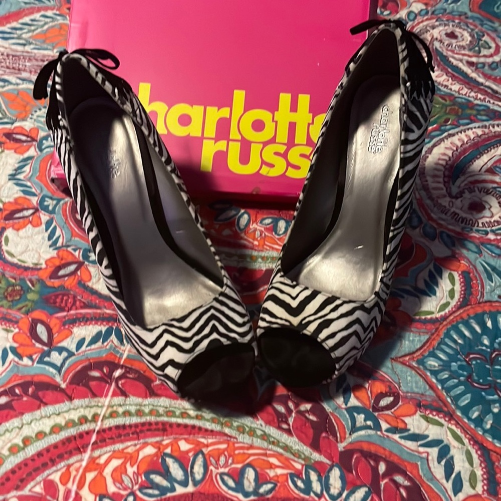 Zebra stripped high heels size 9 (have a box but, not the original box)